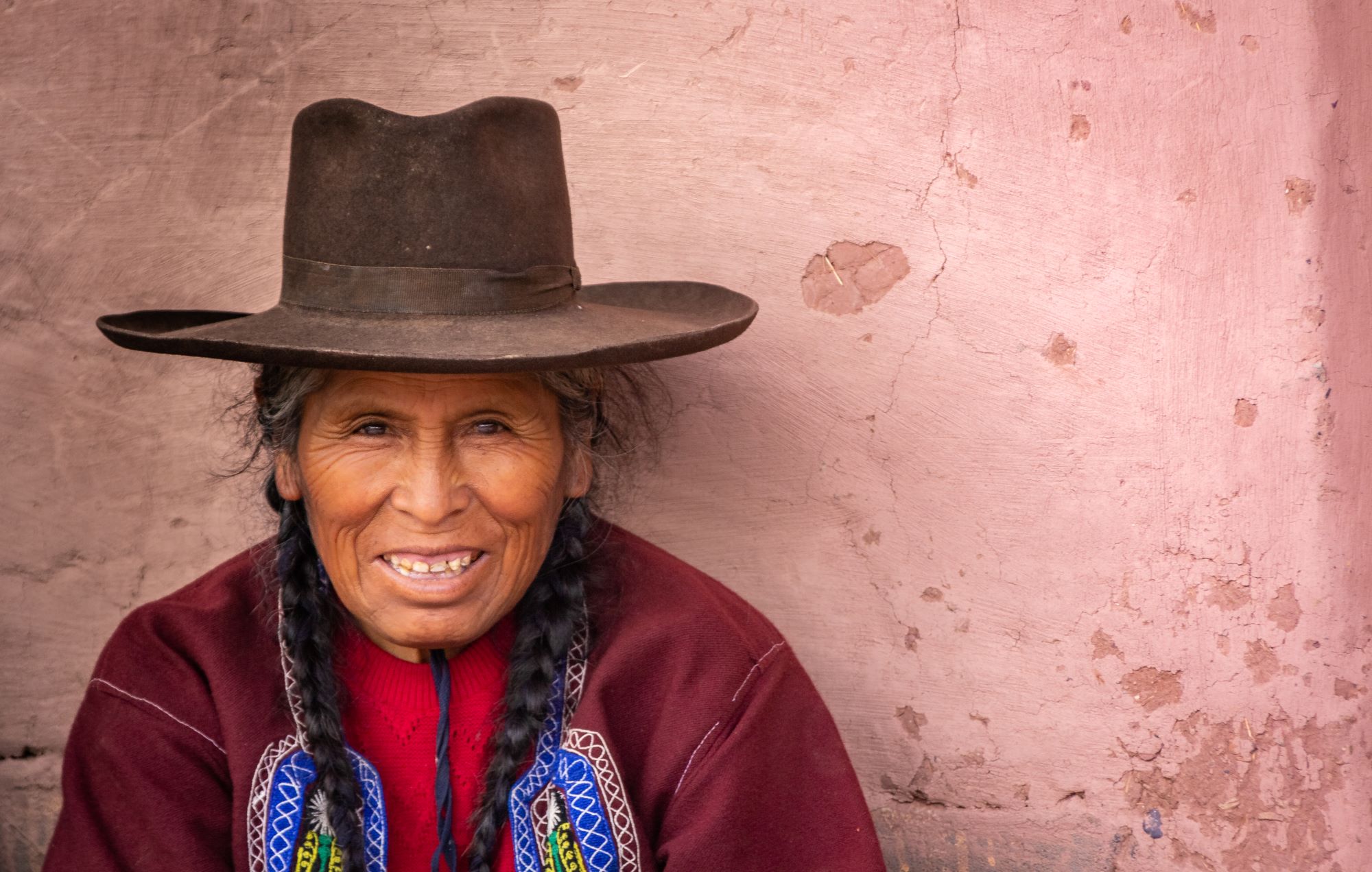 peru-january-02-2012-ethnic-woman-sitting-near-2023-11-27-05-07-31-utc