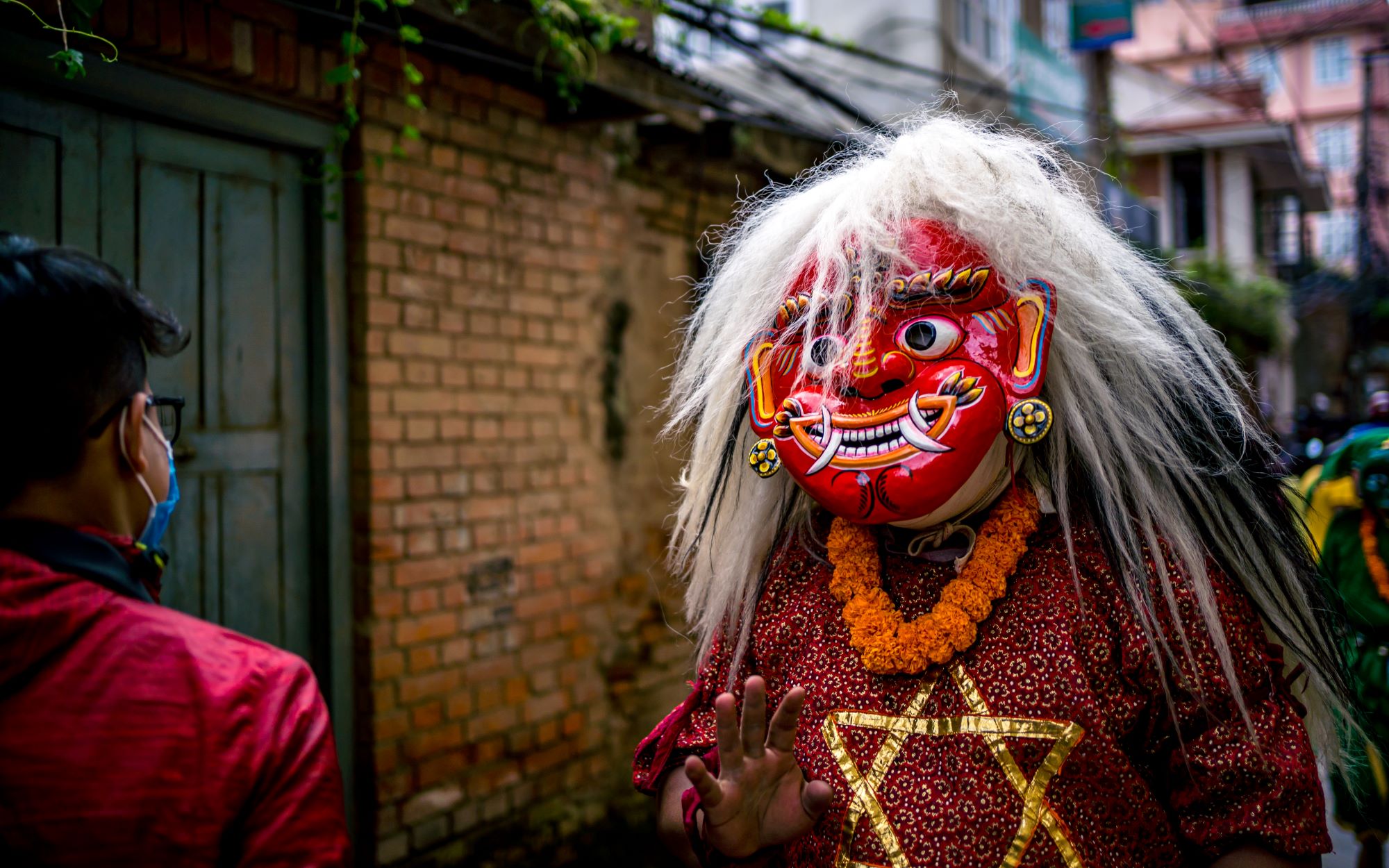 traditional-lakhe-on-face-mask-2023-11-27-05-34-54-utc